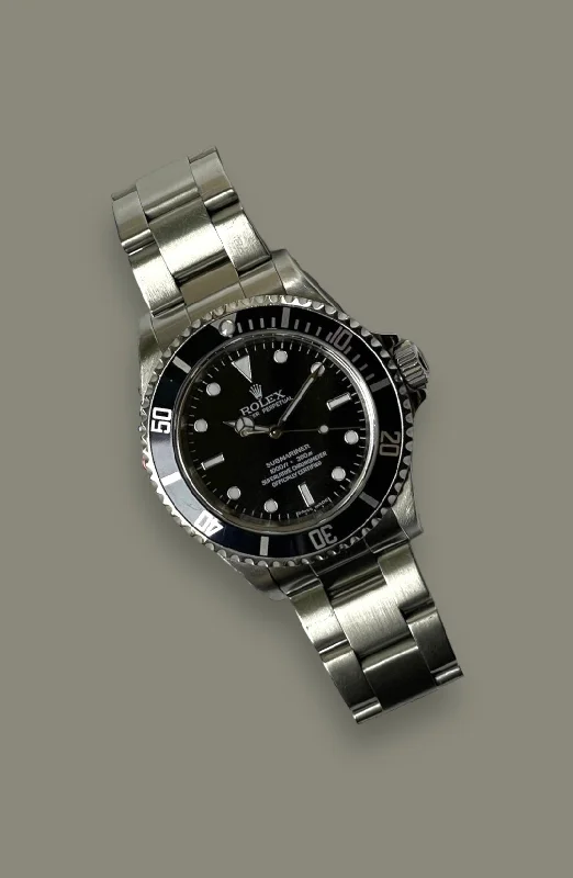 (SOLD) Rolex Submariner 14060M